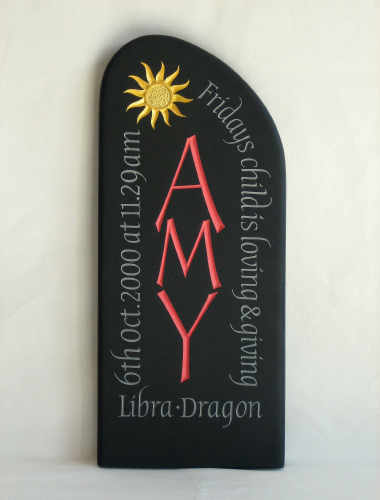 Image of a birth stone carved on Welsh Slate
